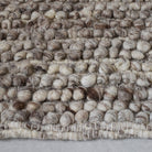 Tapis en laine naturelle mélangée Nunamae - Chiné | Effet bouclé