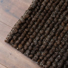 Tapis en laine naturelle Nunamae - Marron | Effet bouclé